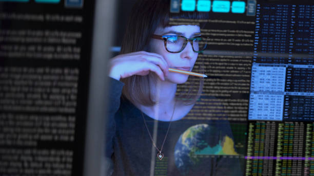 A growth marketer analyzing data on multiple screens to accelerate experimentation.
